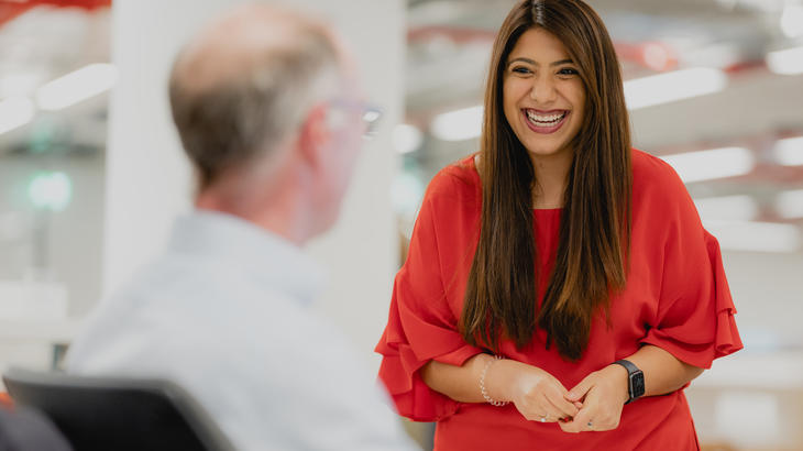 Two Landsec employees laughing