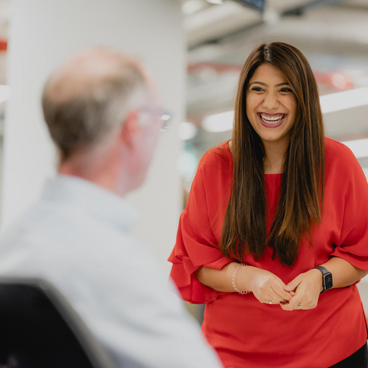 Two Landsec employees laughing